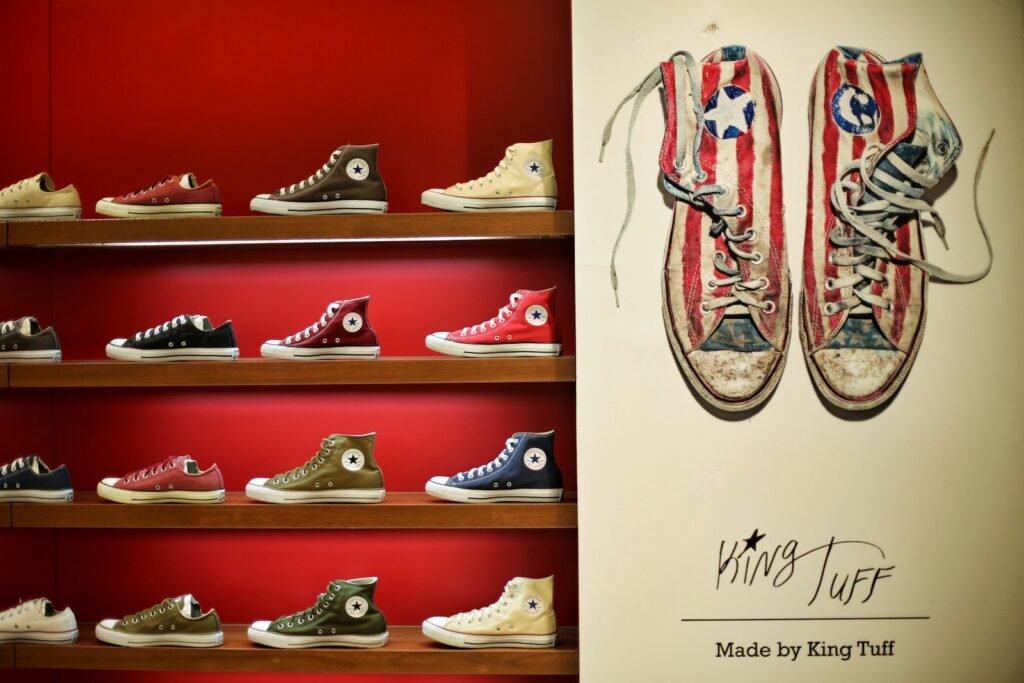 a display case with a bunch of shoes on it