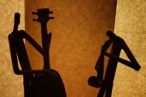 silhouette of a person standing on a ladder, jazz