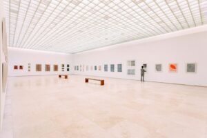 person looking at painting, art, gallery, museum, music, sound