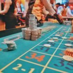 a casino table with a lot of chips on it, gambling, casino, betting,