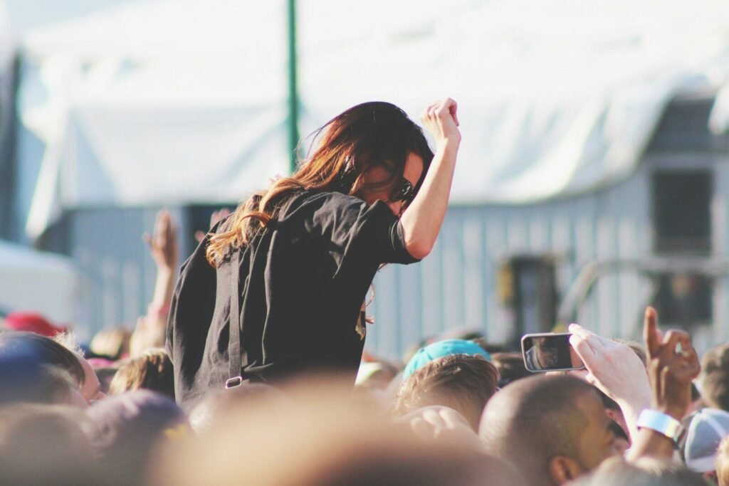woman on top of crowd, Richmond Jazz & Music Festival, festival, events, celebrations