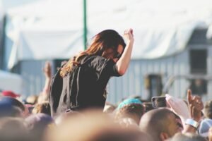 woman on top of crowd, Richmond Jazz & Music Festival, festival, events, celebrations