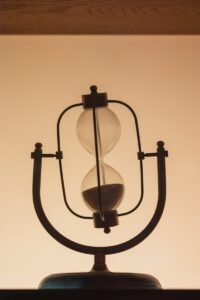 an hourglass sitting on top of a table